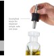 SET 2 CONTENITORI DOSATORI PER OLIO E ACETO CON BASE IN LEGNO DI ACACIA 